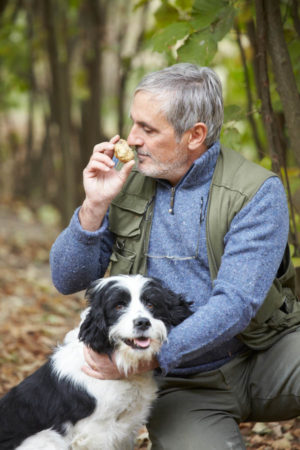 A truffle hunter and his dog, Piedmont