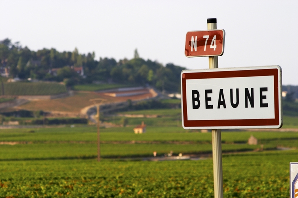 A road sign for Beaune in the vineyards