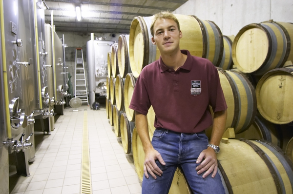 A Burgundy wine grower in his cellar