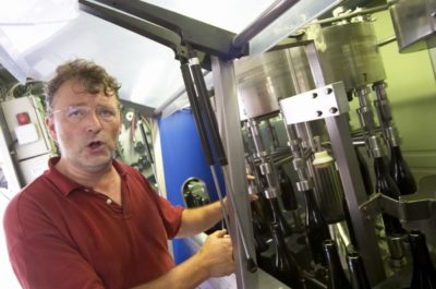 The winemaker in the wine cellar