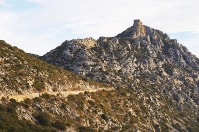 A medieval fortress perching on the mountain-top