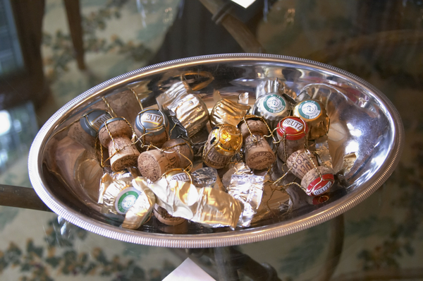 Champagne corks in a silver bowl