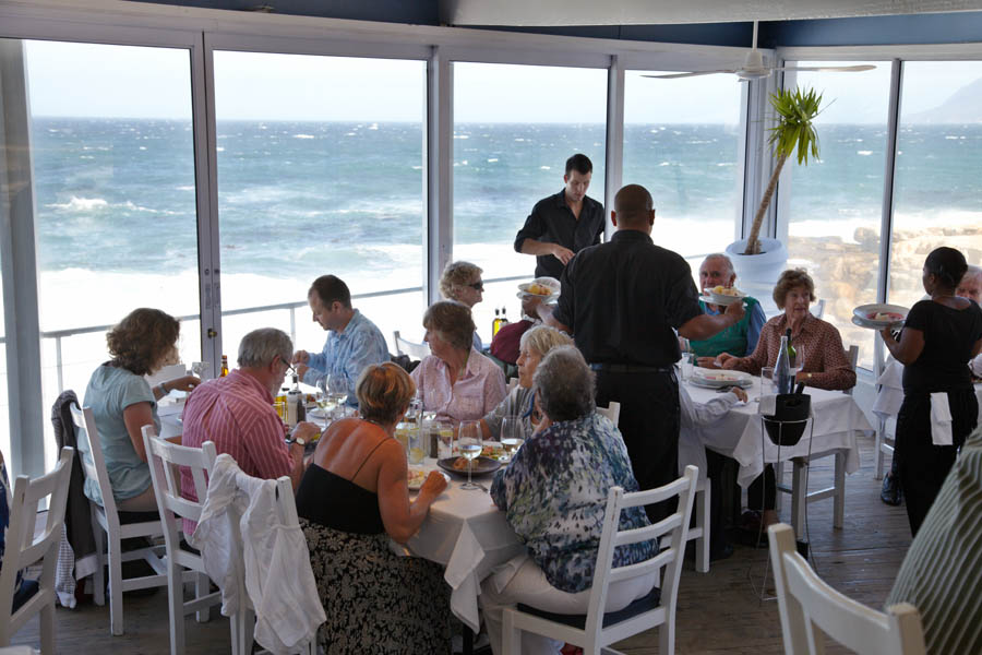 In the restaurant with a view over the sea