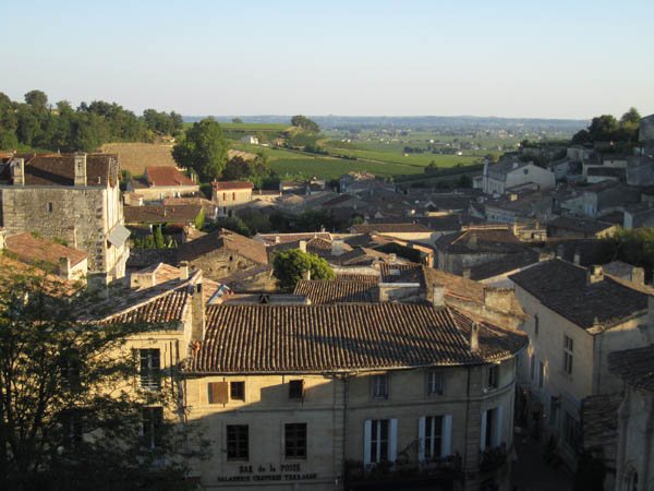 Afternoon sun over the Medieval village of Saint Emilion and the vineyards