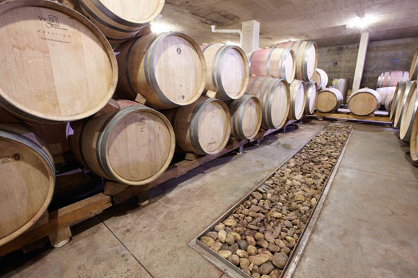 The barrel ageing cellar with stone areas inspired by Feng Shui