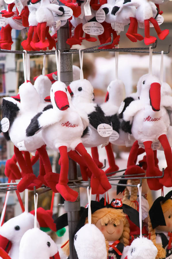 Gift and souvenir shop with storks, Colmar, Alsace