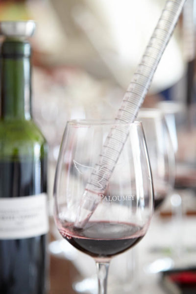 Base wines, measuring pipette and glasses for blending workshop