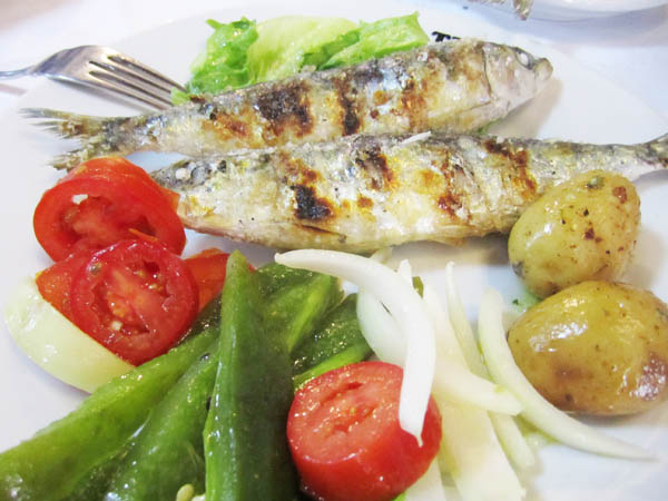 Grilled sardines with a fresh salad in a Matosinhos restaurant in Porto