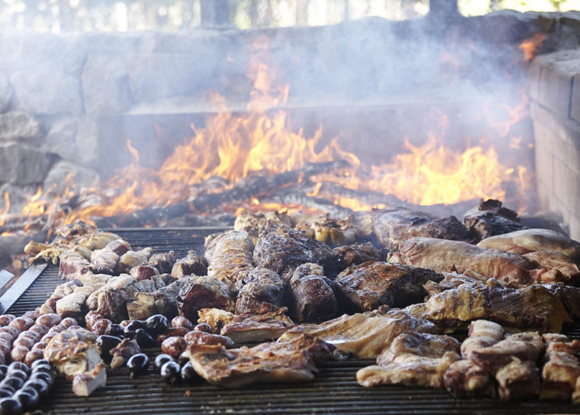 A traditional asado barbecue at a vineyard in Argentina