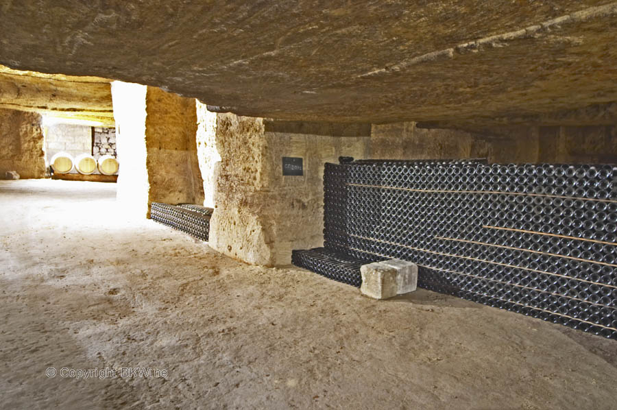 Bottles aging in the cellar at Clos Fourtet, Saint Emilion, Bordeaux