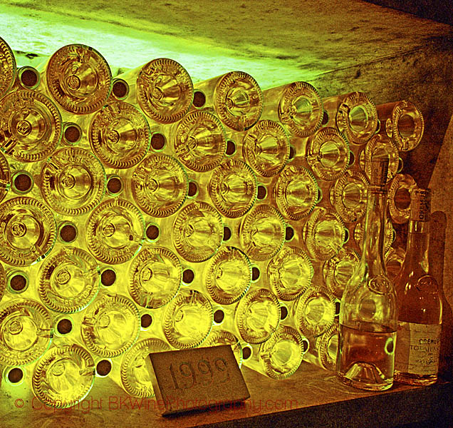 Old bottles with Tokaji in an underground cellar