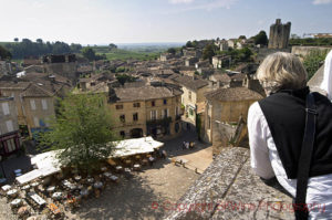 View over Saint Emilion square, rooftops, and vineyards
