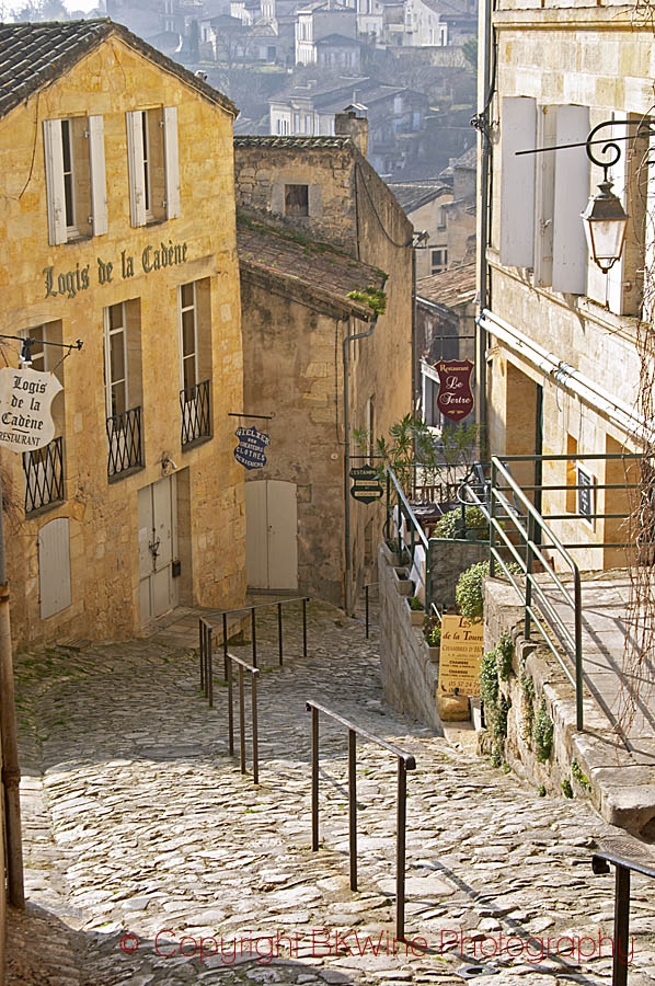 A steep cobble stone street with Logis de la Cadene, Saint Emilion