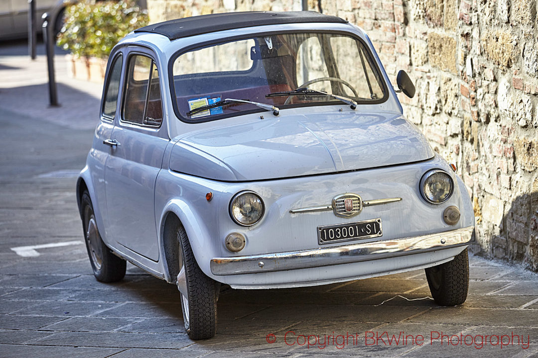 A small Fiat on a street in Italy