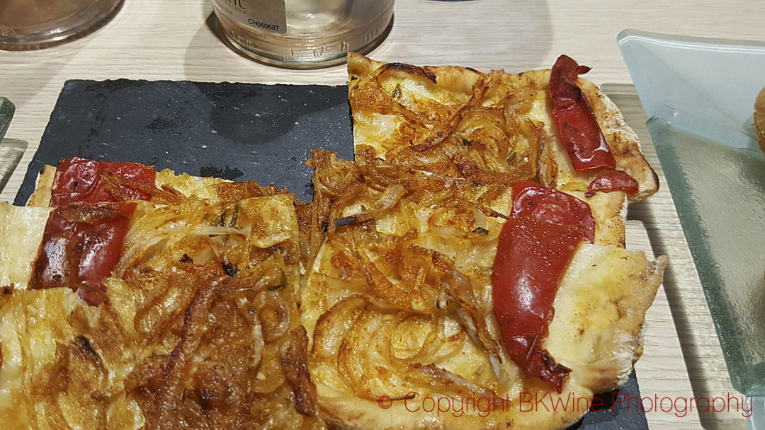 Tapas: a coca de cebolla, like a pizza with onion, copyright BKWine Photography