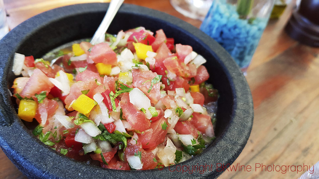 Pebre, pepper, tomato, onion and herb condiment in Chile