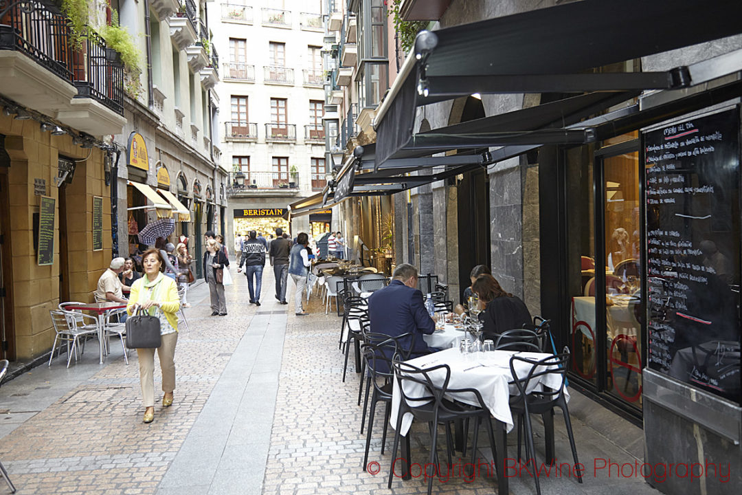 Sidewalk tables at a restaurant in Spain