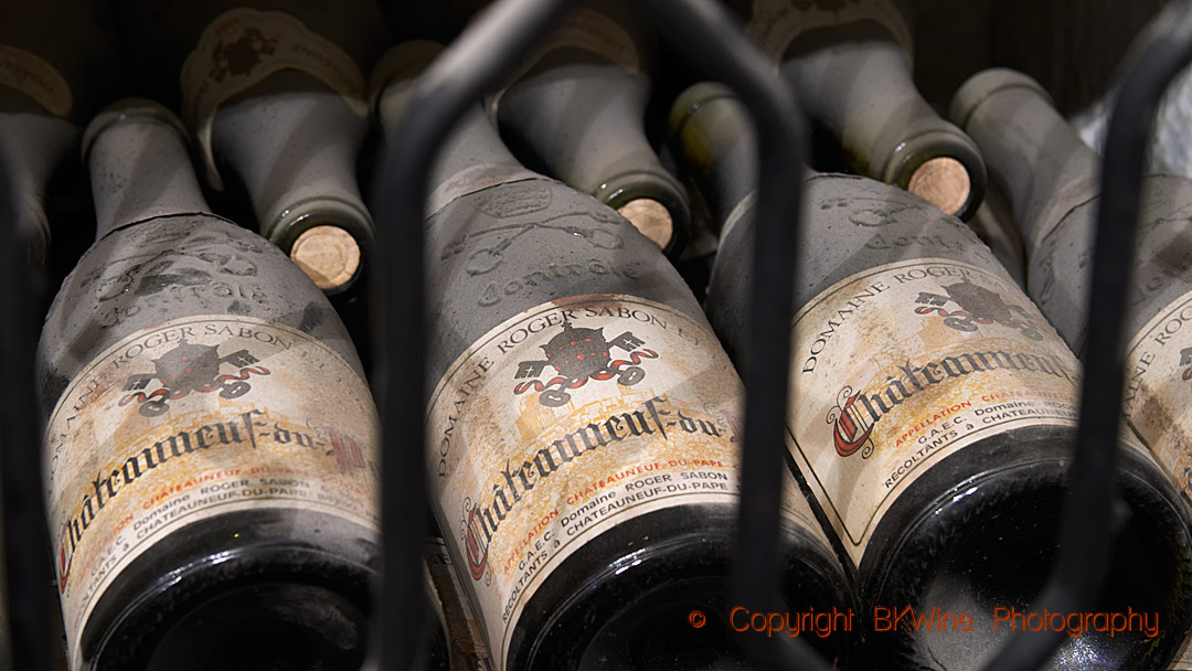 Old bottles in a wine cellar in the Rhone Valley