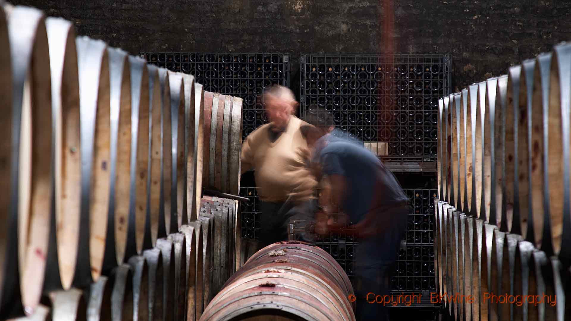 Time to rack the barrels in the cellar in Burgundy