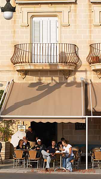 Enjoying the afternoon sunshine at a café in Sitges, Catalonia