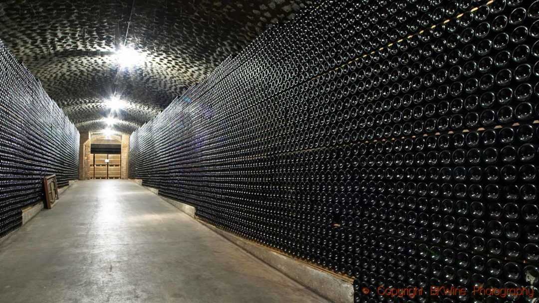 Thousands of bottles of sparkling cava in a wine cellar in Catalonia