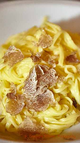 Pasta with plenty of fresh white truffles shavings in Piedmont