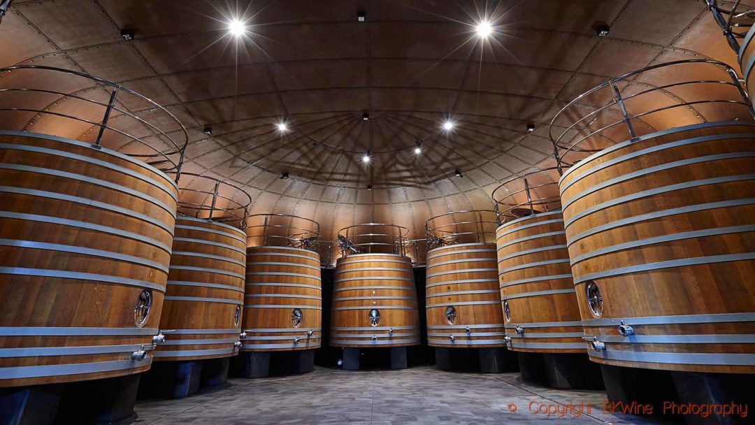 Big traditional wooden vats in a modern design wine cellar in Rioja
