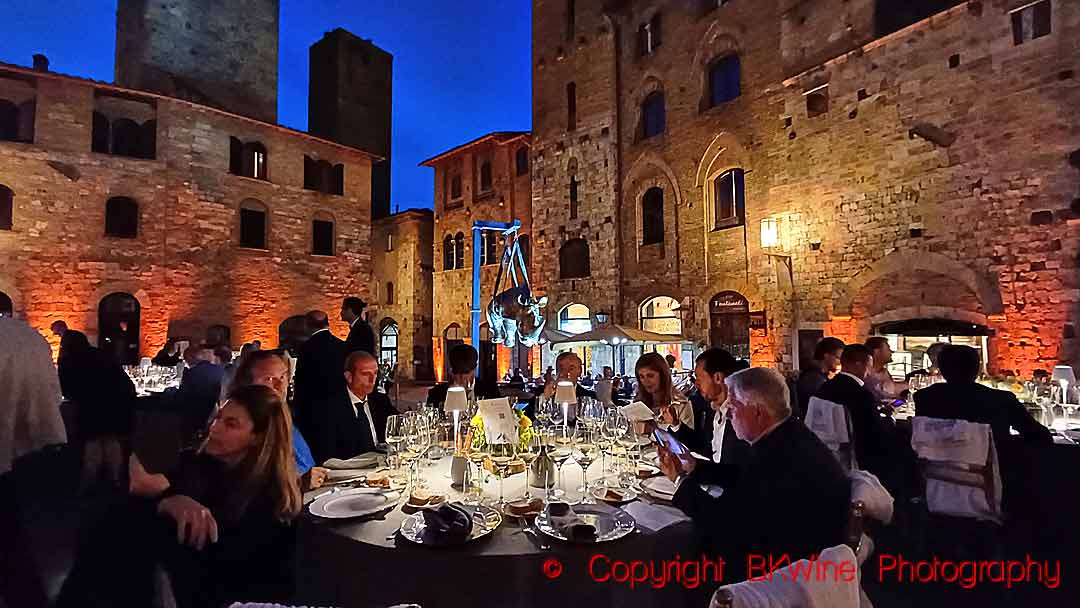 Elegant dining outside in a town square in Tuscany, Italy