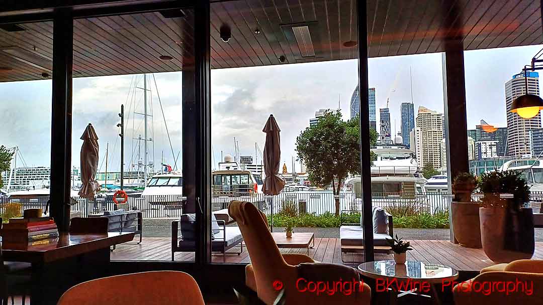 The view over the Viaduct Basin at The Living Room at Park Hyatt in Auckland