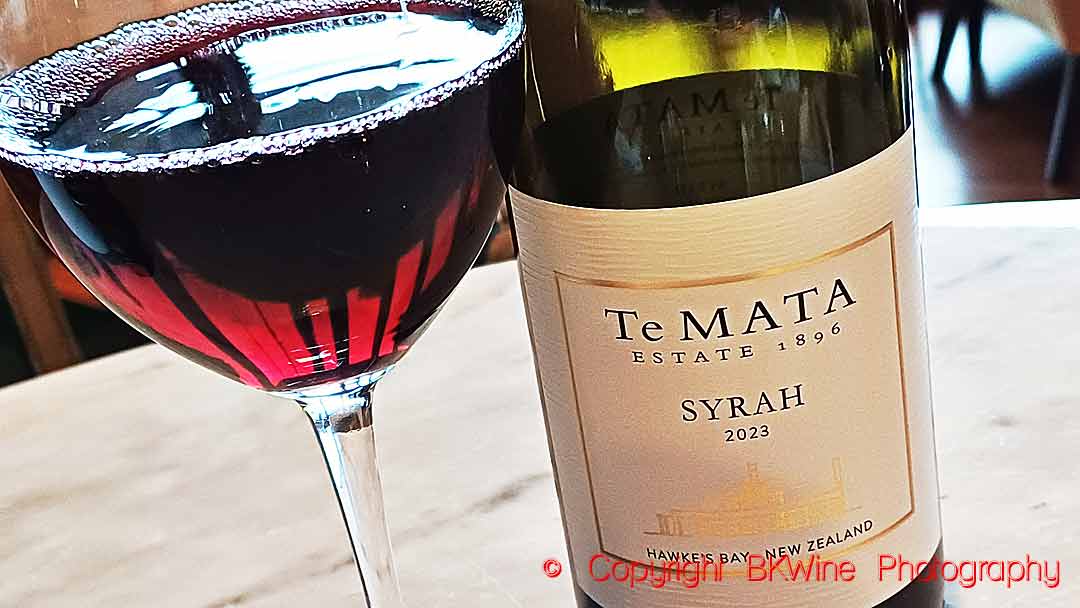 A bottle and glass of Te Mata Syrah, Hawkes Bay, at a restaurant in Auckland, New Zealand