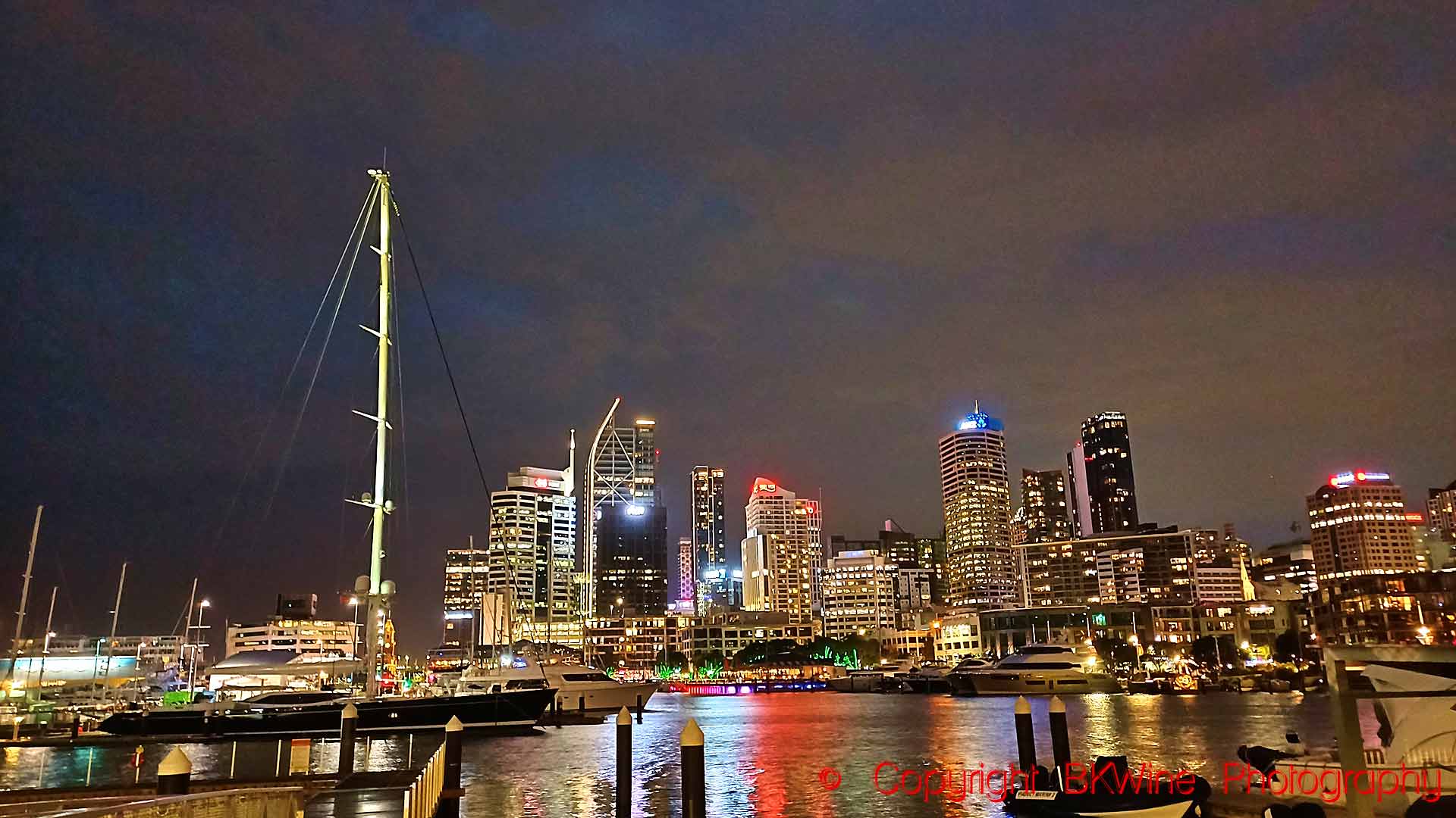 The skyline and boats in the evening at the Viaduct Basin in Auckland, New Zealand